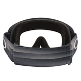 A close-up of an Oakley OFrame Goggle, featuring a dark gray to black gradient fabric with a textured pattern and a black foam interior.